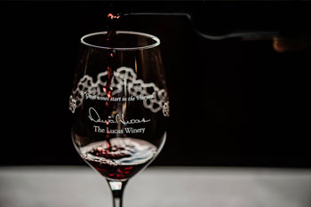 Wine pouring into Lucas Winery glass